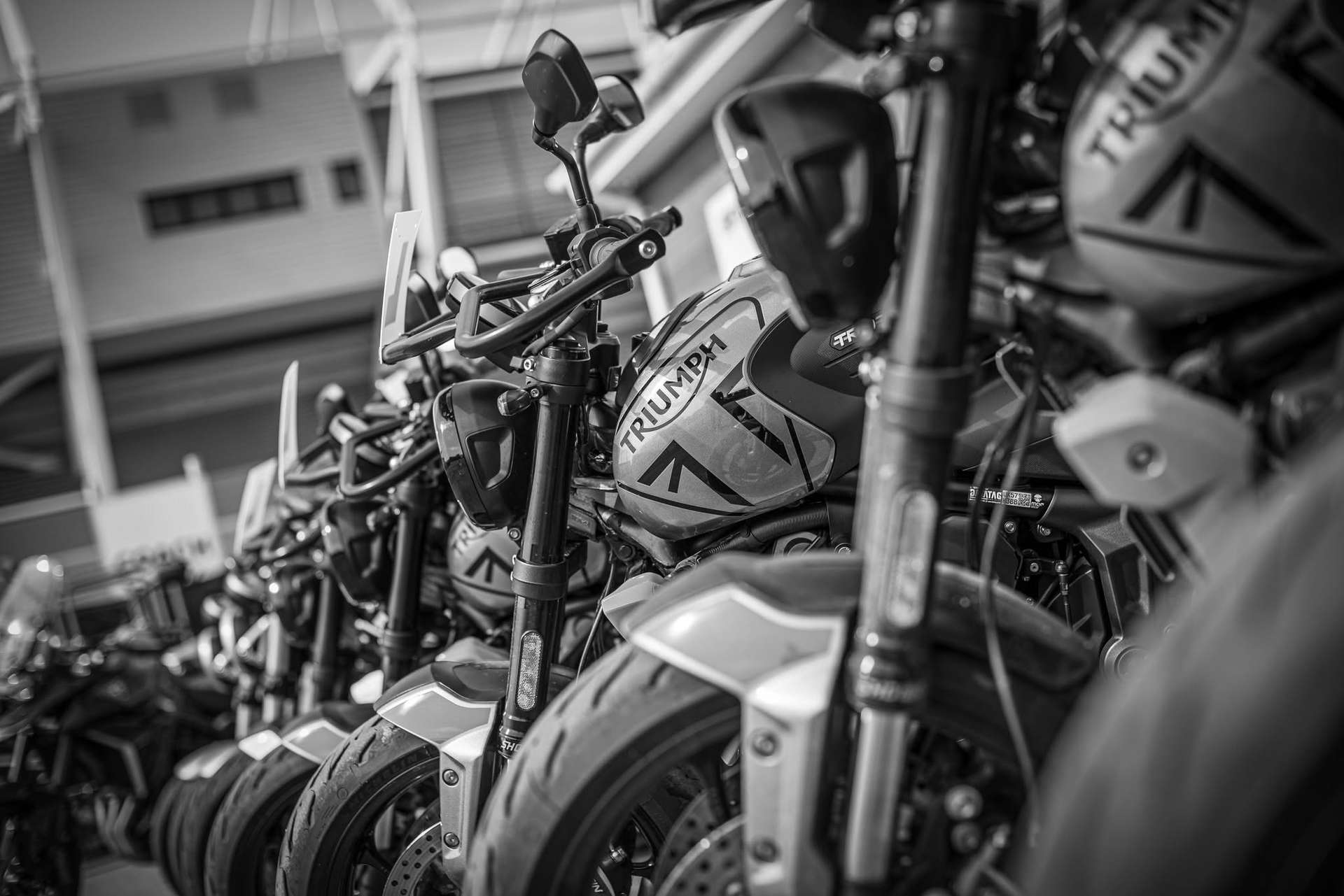 The Triumph motorcycle fleet lined up outside the Bryans training school